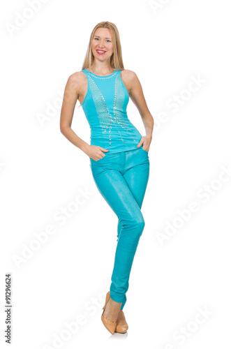 Pretty blond woman in blue pants and shirt isolated on white