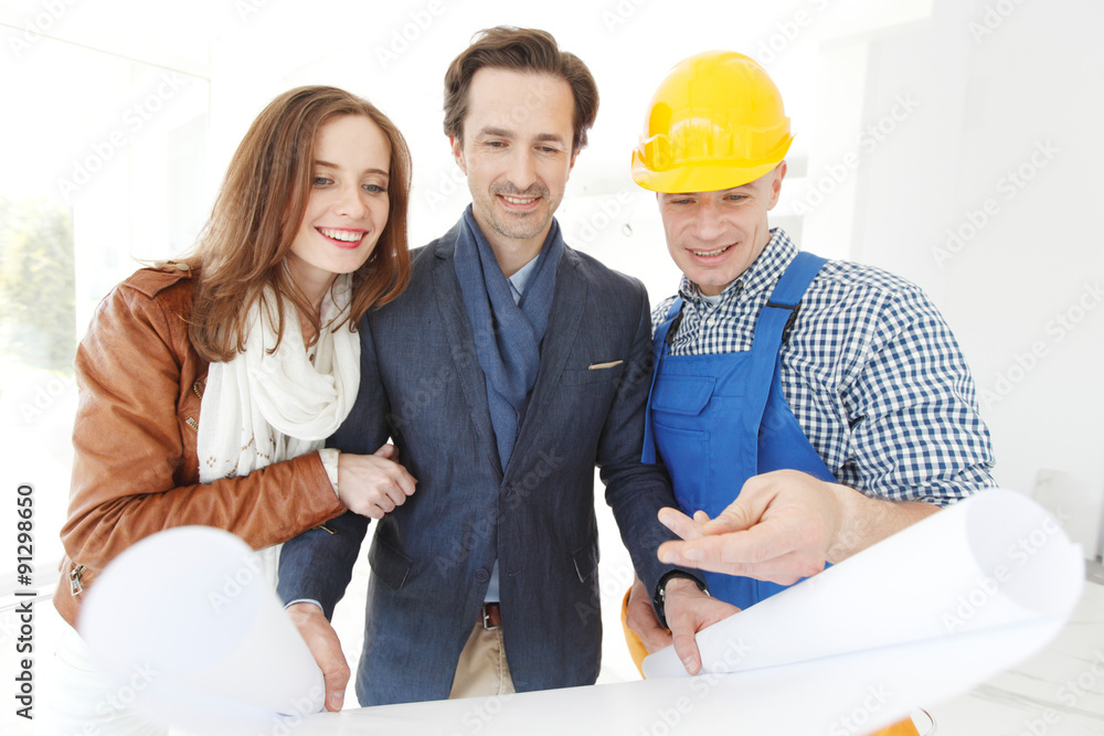 foreman and a young couple foreman and a young couple