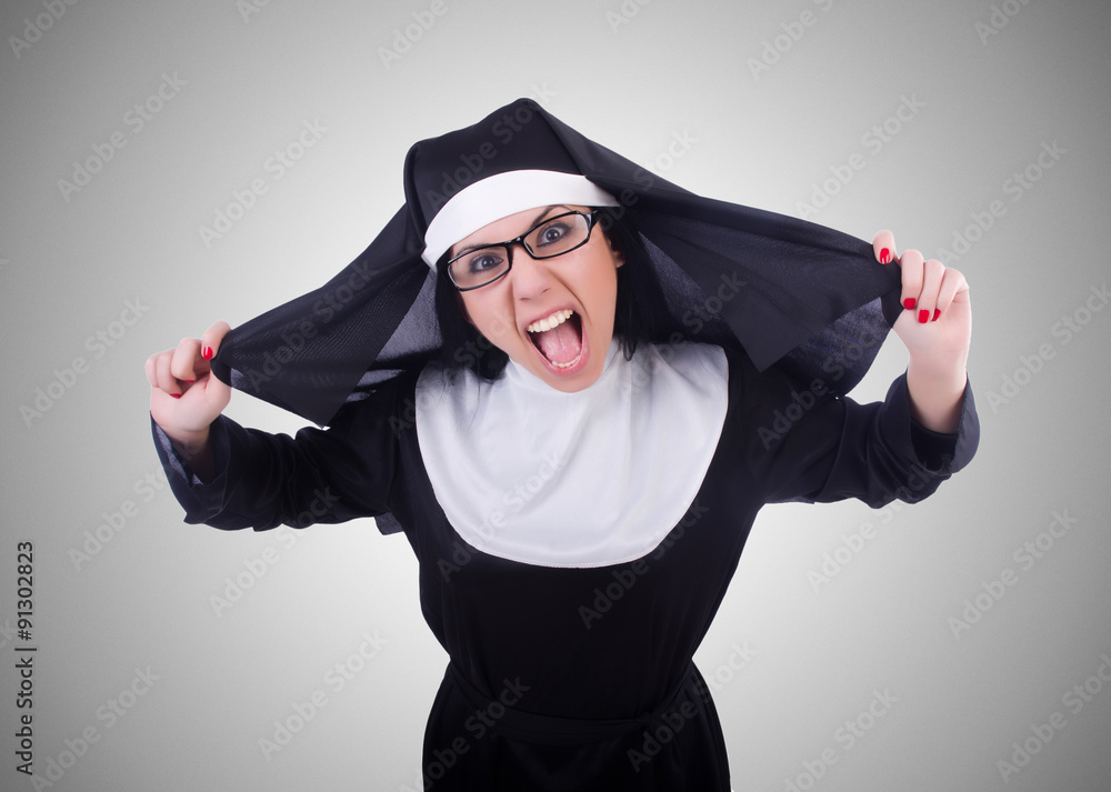Funny nun isolated on the white Funny nun isolated on the white