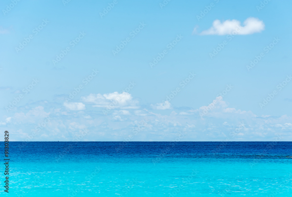 blue sky and water of ocean