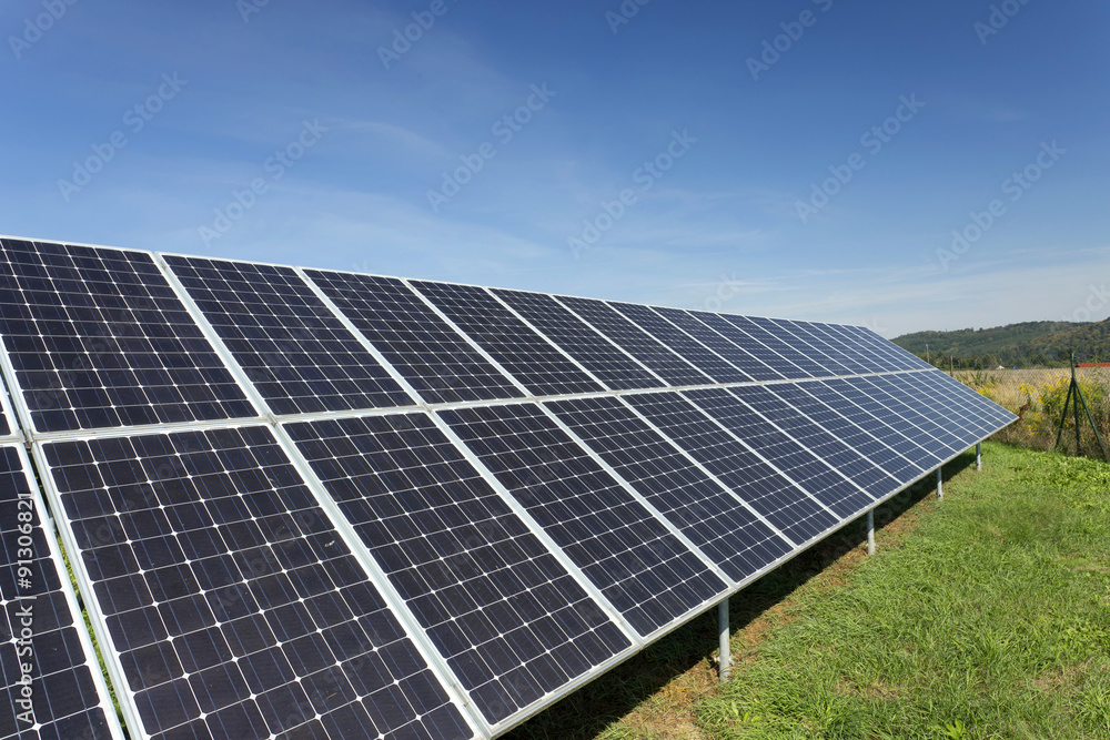 Solar Power Station on the summer Meadow