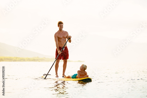 Father and Son Stand Up Paddling