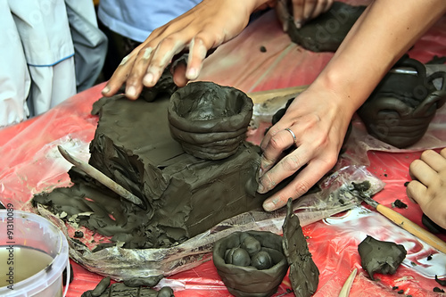 Children modeling clay at a workshop held at the International Children's Day. Timisoara, Romania.