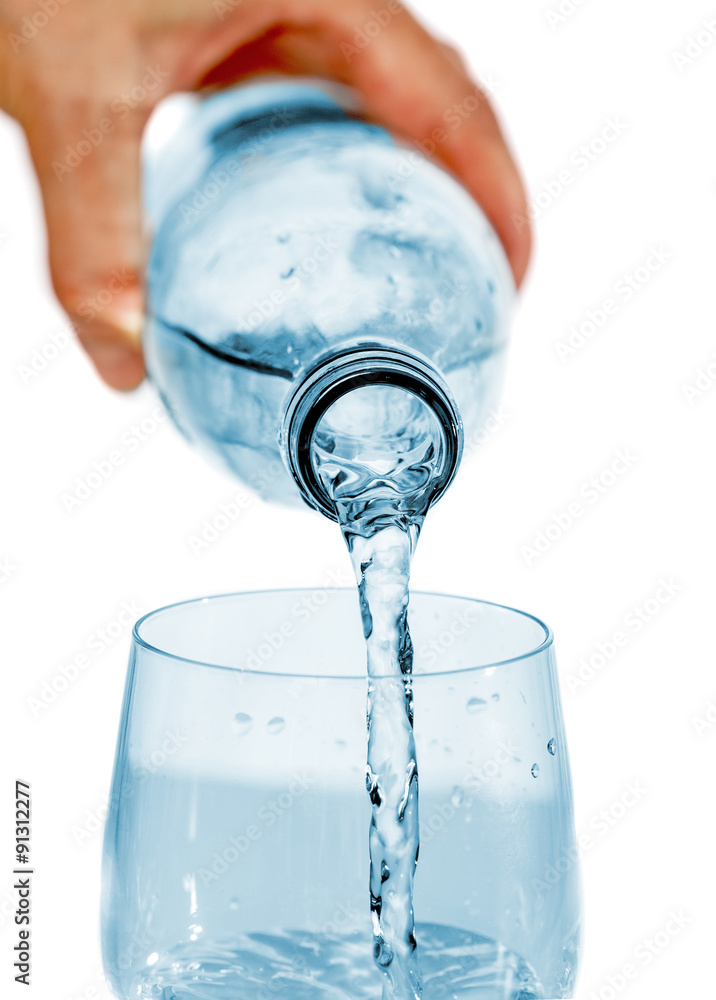Drinking water pouring from bottle to glass Drinking water pouring from bottle to glass