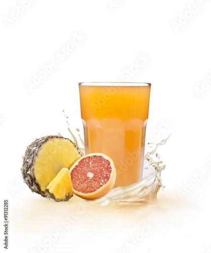 Fototapeta Naklejka Na Ścianę i Meble -  Pineapple and orange juice with splash.