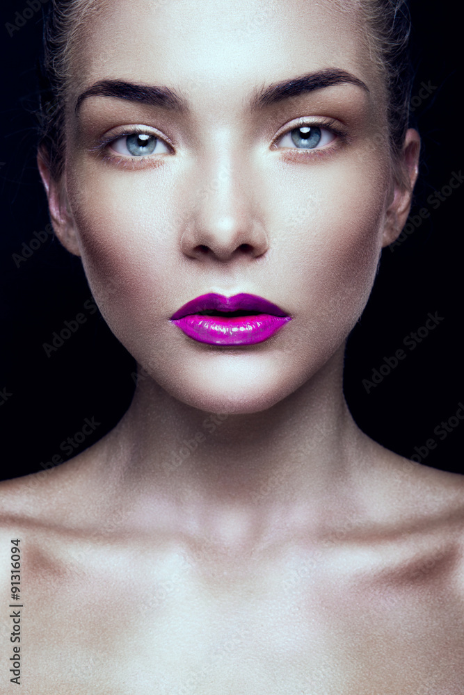 Close-up portrait of beautiful woman with bright make-up Close-up portrait of beautiful woman with bright make-up