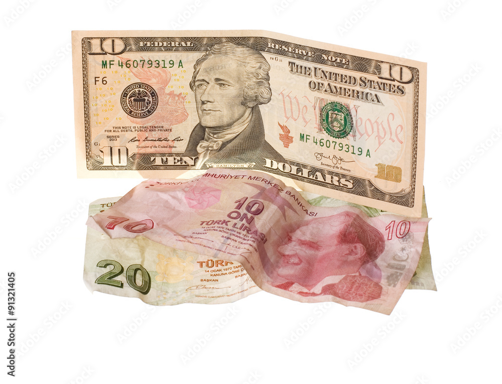 Financial crisis: new ten dollars over thirty crumpled turkish lira. Isolated on white. Financial crisis: new ten dollars over thirty crumpled turkish lira. Isolated on white.