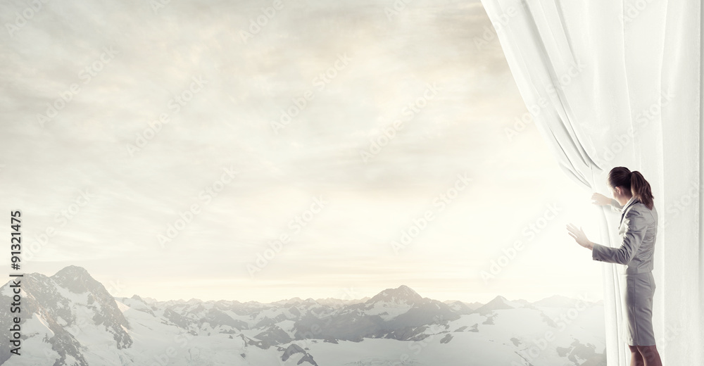 Fototapeta premium Woman open curtain