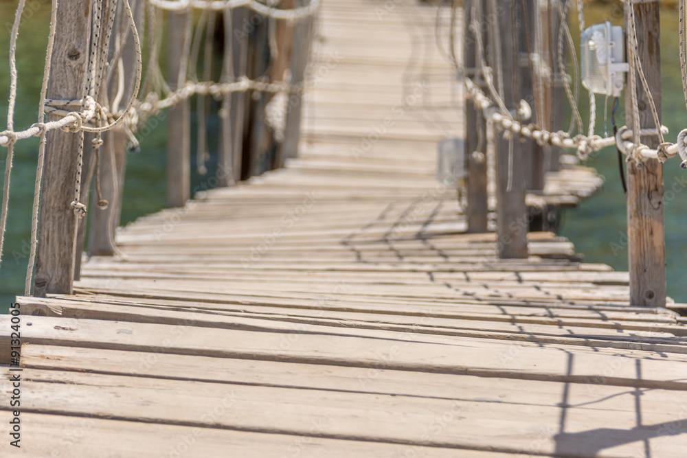 wooden bridge leading to island in Zakynthos, Greece