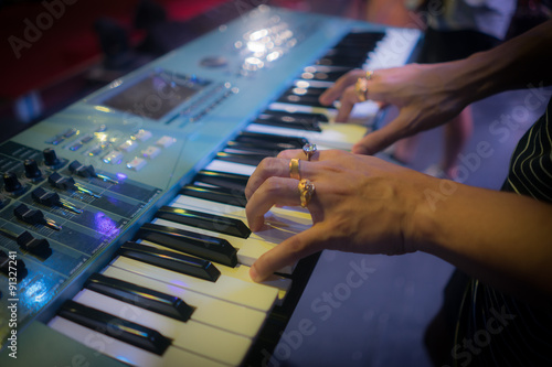 The pianist hand on electric piano