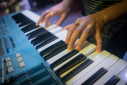 The pianist hand on electric piano