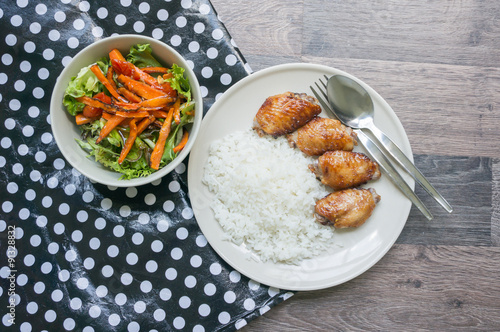 Rice and grilled chicken  with   salad