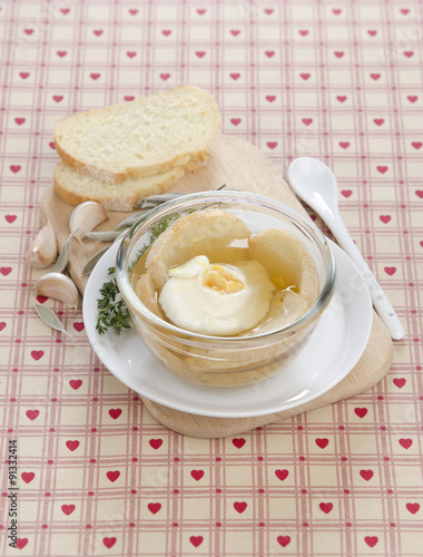 bouillon with poached egg photo