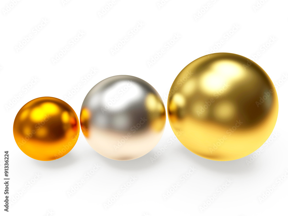 Three shining golden,silver and bronze balls isolated on white background Three shining golden,silver and bronze balls isolated on white background