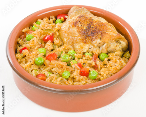 Arroz Con Pollo - Chicken and rice cooked with sofrito and beer.
