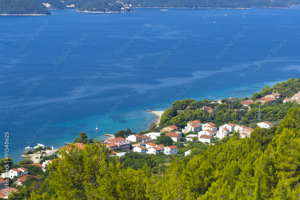 view of the azure sea coast with the town