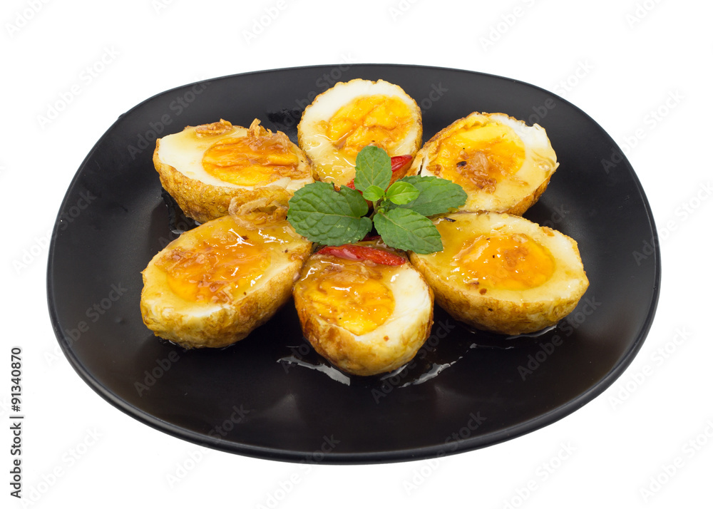 Dish of eggs with tamarind sauce Dish of eggs with tamarind sauce