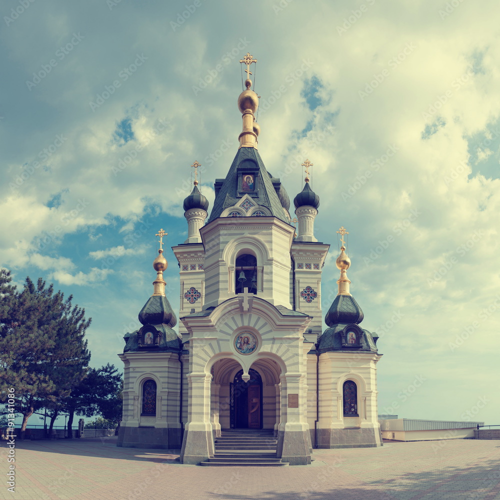  Orthodox church in Foros with sky and clouds