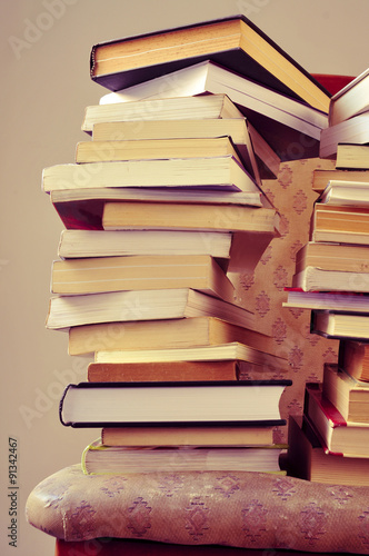 books on a chair, with a retro effect