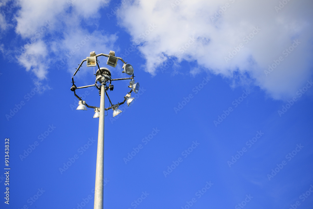 faulty spotlights. tower with searchlights on which an incomplete set of lamps faulty spotlights. tower with searchlights on which an incomplete set of lamps