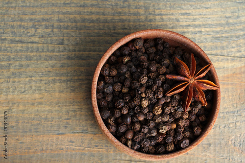 coffee with star anise on wooden background