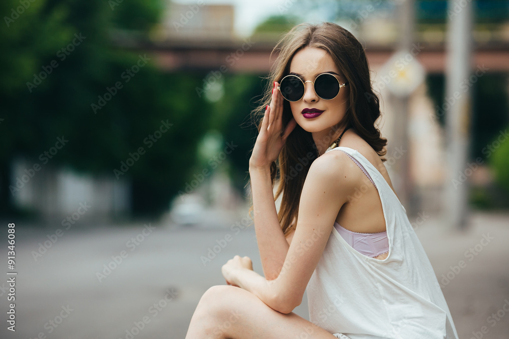 beautiful girl in sunglasses sitting beautiful girl in sunglasses sitting