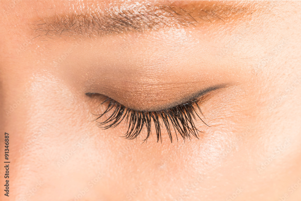 Fototapeta premium アジア人女性クローズアップ つけまつげAsian woman and false eyelashes