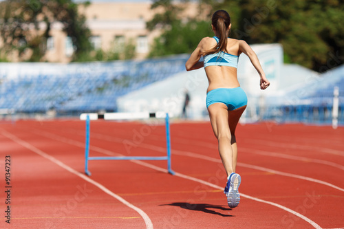 Runner - woman training.Female fitness concept