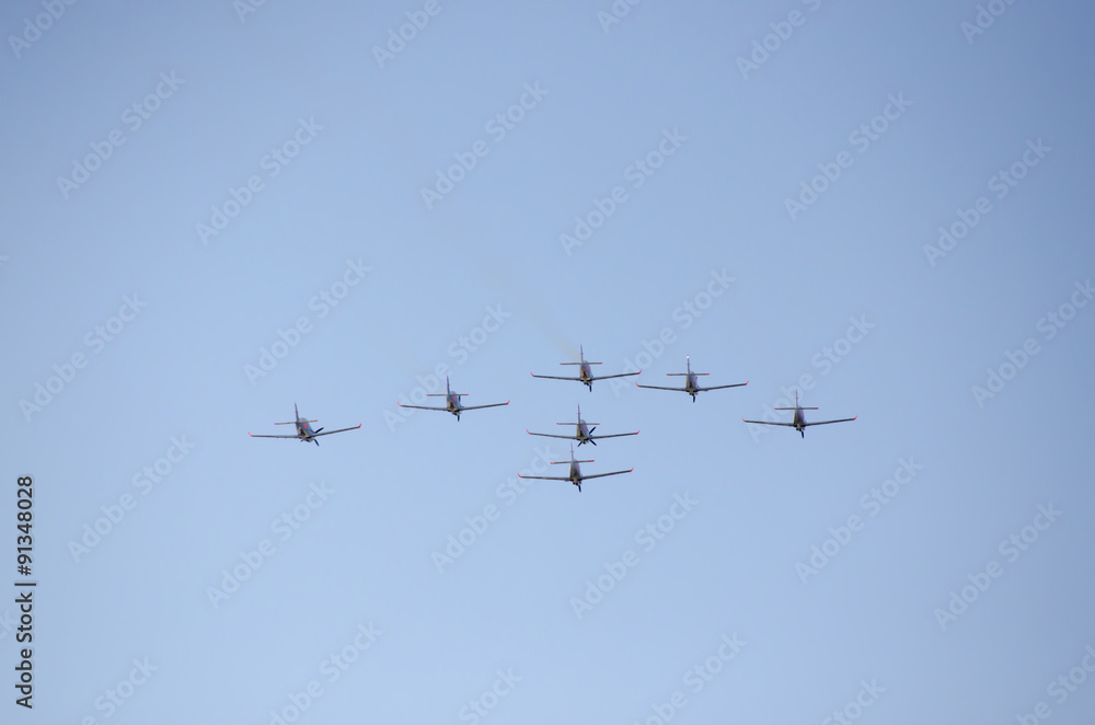 seven aerobatic wings close formation