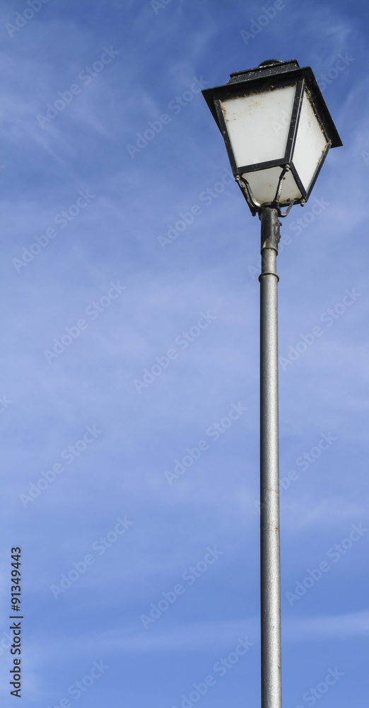 lamppost in blue sky
