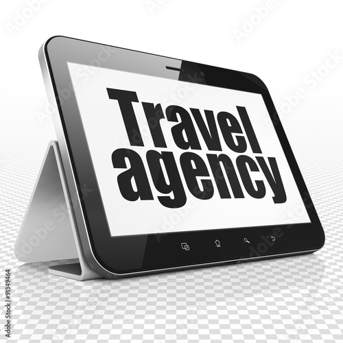 Vacation concept: Tablet Computer with Travel Agency on display