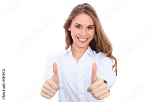 Beautiful happy smiling woman with thumbs up, isolated on white background