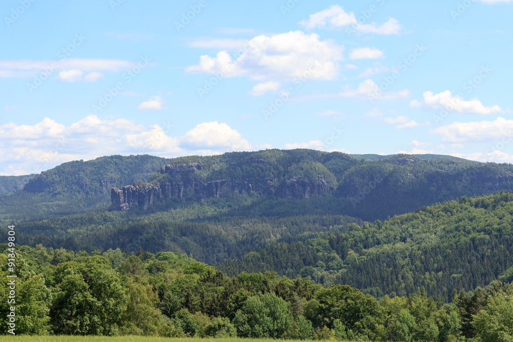 Fototapeta premium Group of rocks Affensteine with blue sky in Saxon Switzerland