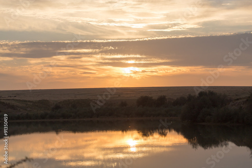 Fototapeta Naklejka Na Ścianę i Meble -  beautiful sunset on the lake
