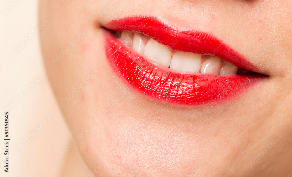 Fototapeta premium beautiful smile with red lips