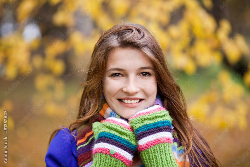 Portrait of beautiful young girl in an autumn park Portrait of beautiful young girl in an autumn park