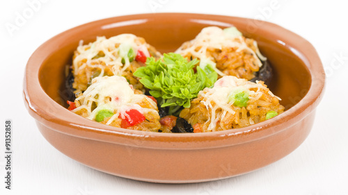 Stuffed Mushrooms - Mushrooms topped with cooked spicy rice and cheese. 