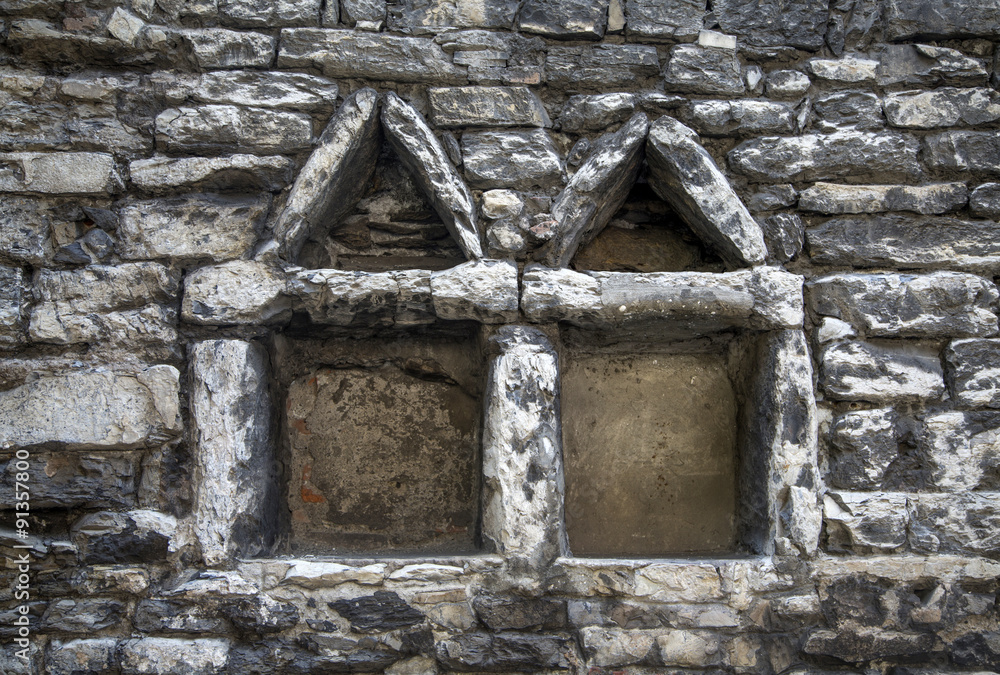 Stone window in Turin, Italy