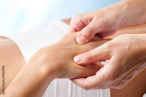 Therapeutic hand massage.