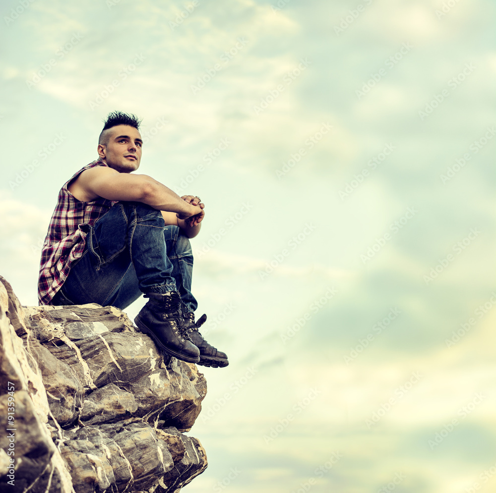 Handsome Athletic Man Looking Away Against Sky Handsome Athletic Man Looking Away Against Sky