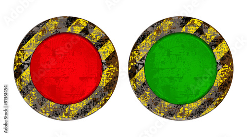 Vekton dirty old rusty red and green round button with glowing backlight scratched on a yellow background with black stripes warning about the dangers of