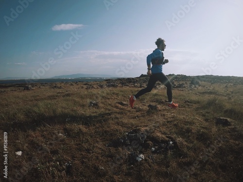 man runs in fjords