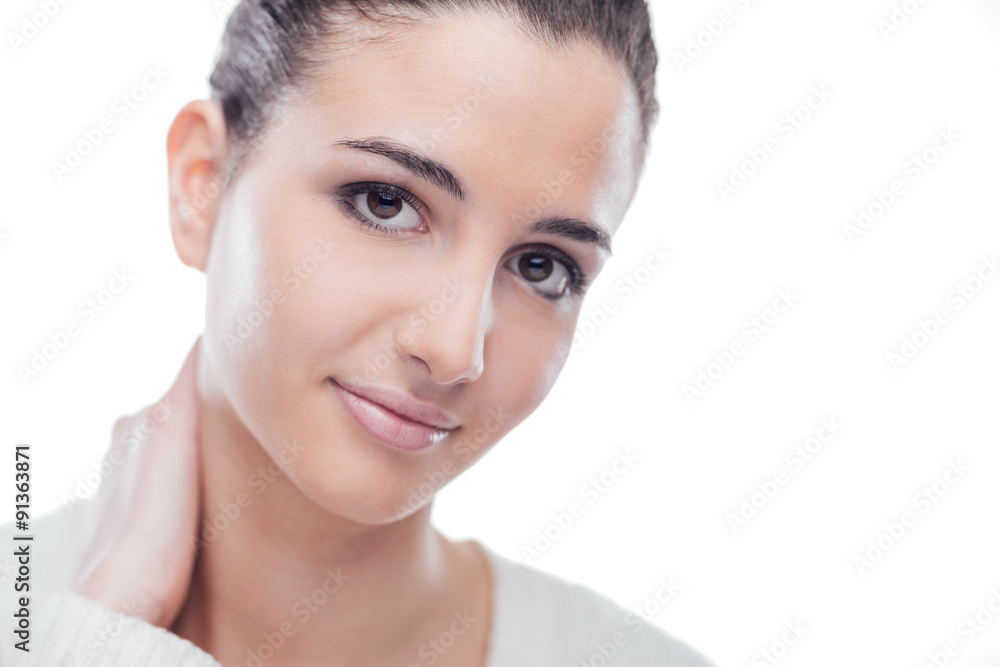 Attractive woman touching her neck Attractive woman touching her neck