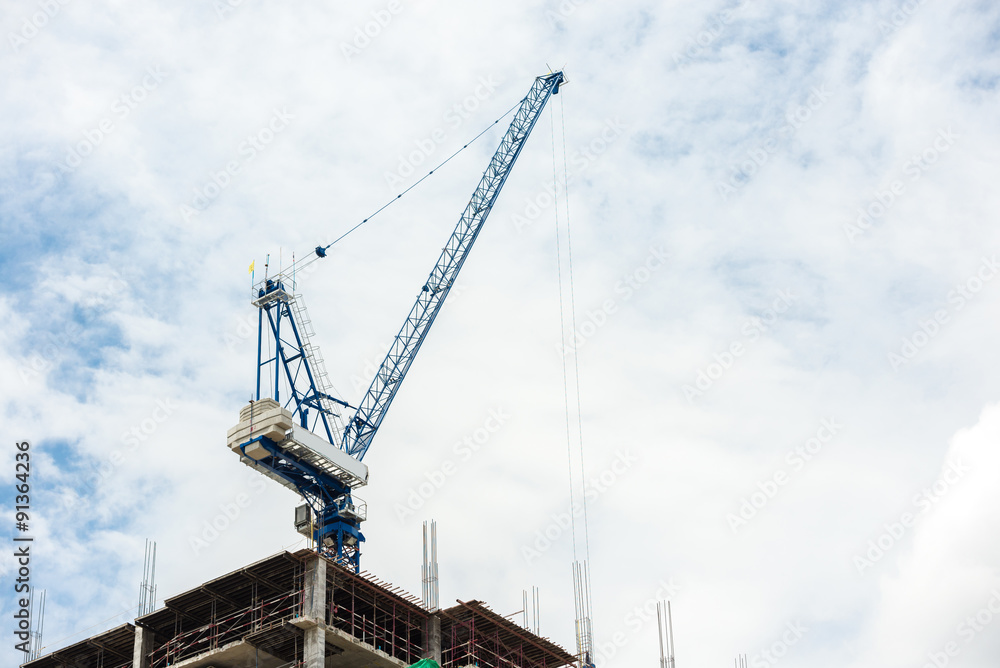 Construction crane on tower