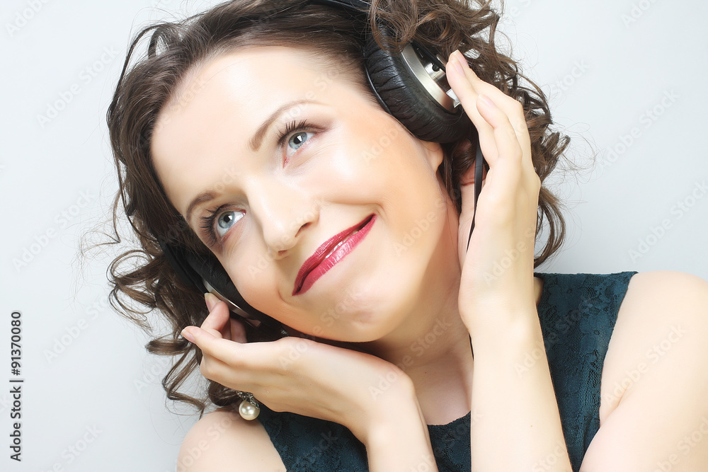 Fototapeta premium woman with headphones listening to music