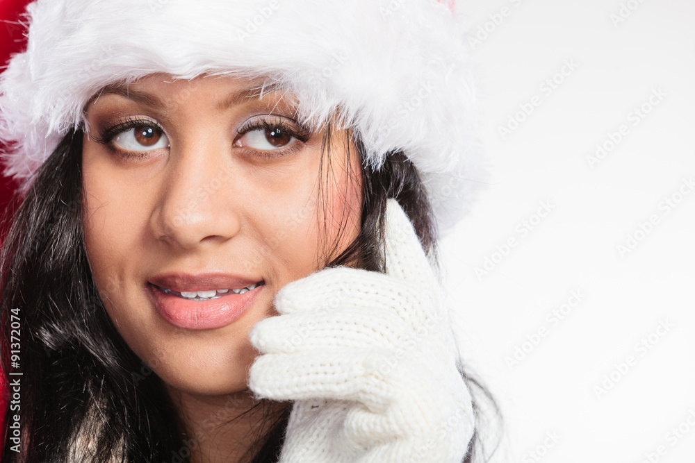 Woman mixed race santa helper hat portrait Woman mixed race santa helper hat portrait