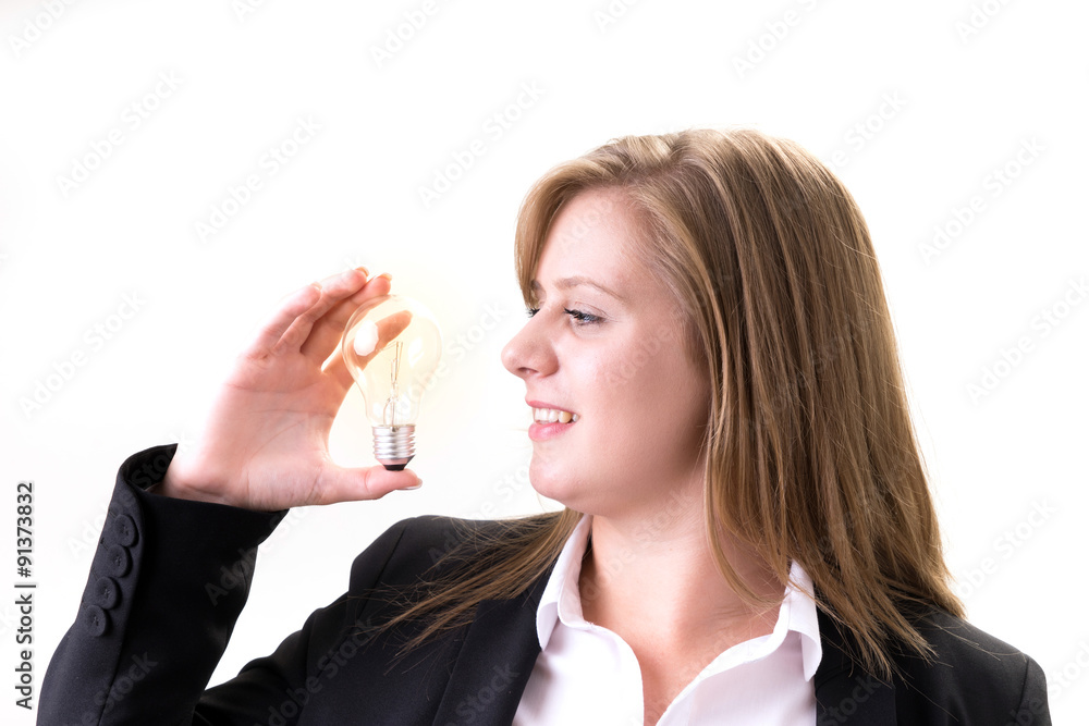 young businesswoman having a light bulb; brilliant idea young businesswoman having a light bulb; brilliant idea
