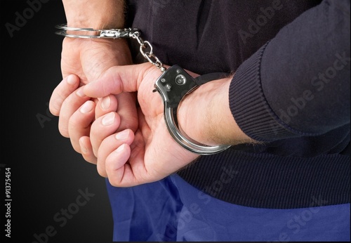 Criminal Handcuffs. © BillionPhotos.com