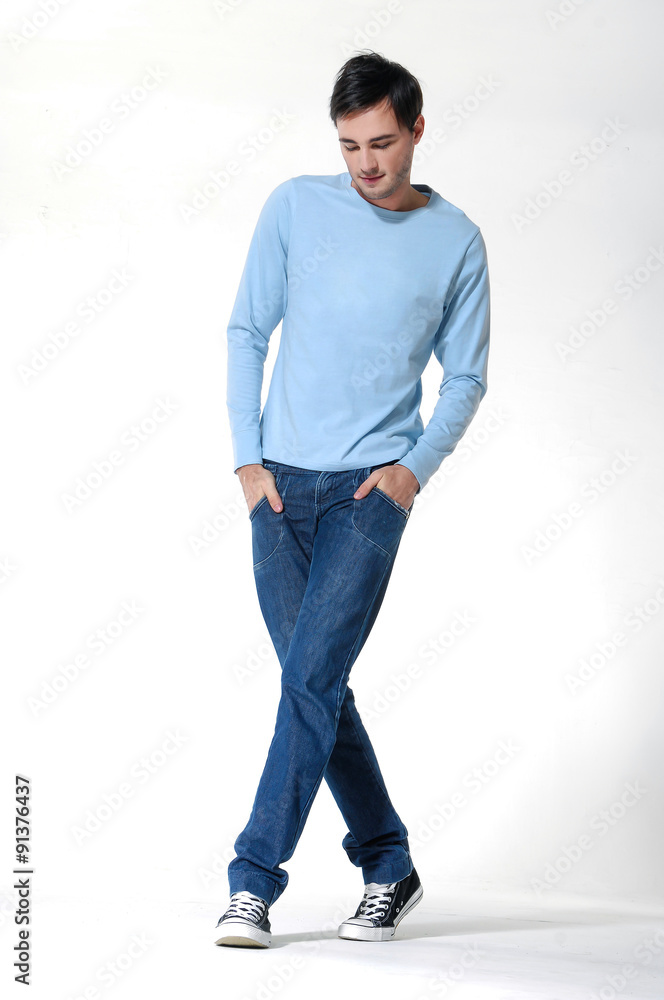 Full body Young mal model posing in the studio Full body Young mal model posing in the studio
