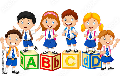 Happy school kids with alphabet block